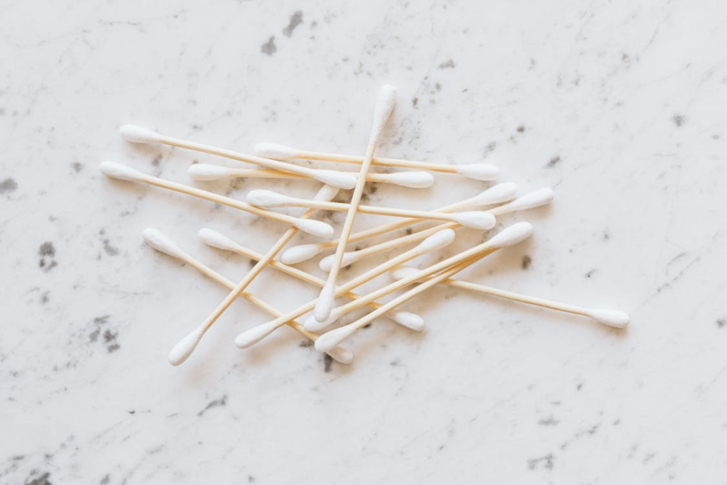  An image of cotton buds on a white surface
